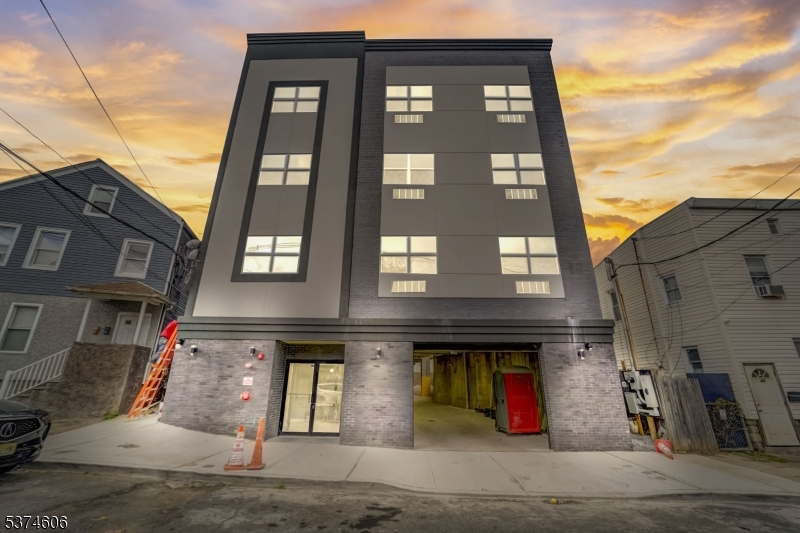 48 Chadwick Street, Unit 203 Paterson, NJ 07503 - Photo 15 of 16 a front view of a building