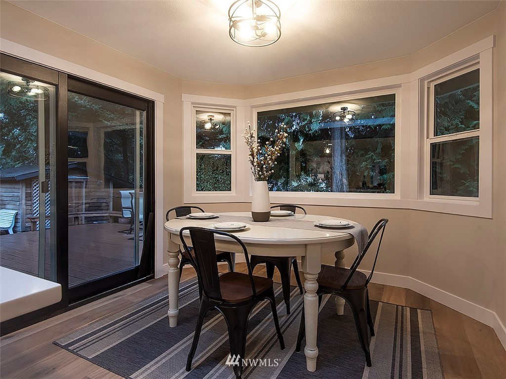 129 200th Place Southeast Bothell, WA 98012 - Photo 15 of 40 a view of a dining room with furniture window and outside view