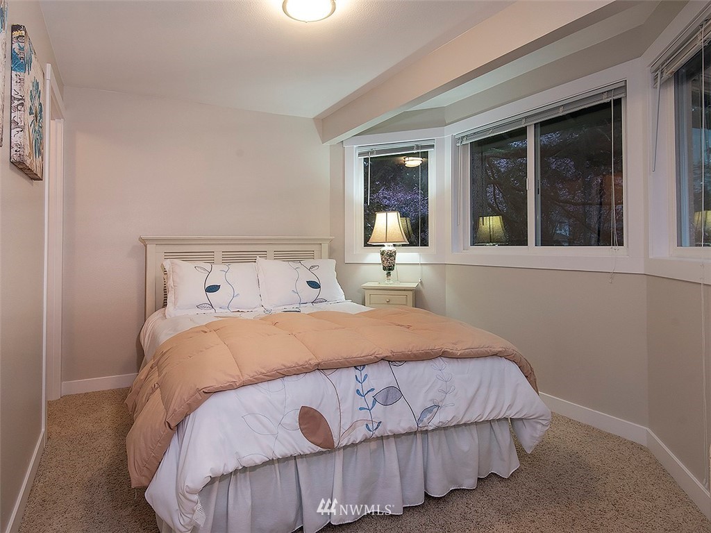 129 200th Place Southeast Bothell, WA 98012 - Photo 32 of 40 a bedroom with a bed and window