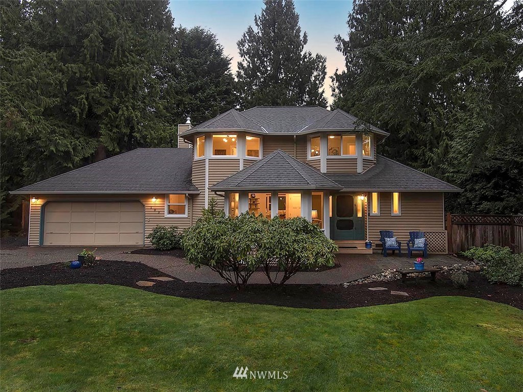 129 200th Place Southeast Bothell, WA 98012 - Photo 40 of 40 a front view of a house with a yard