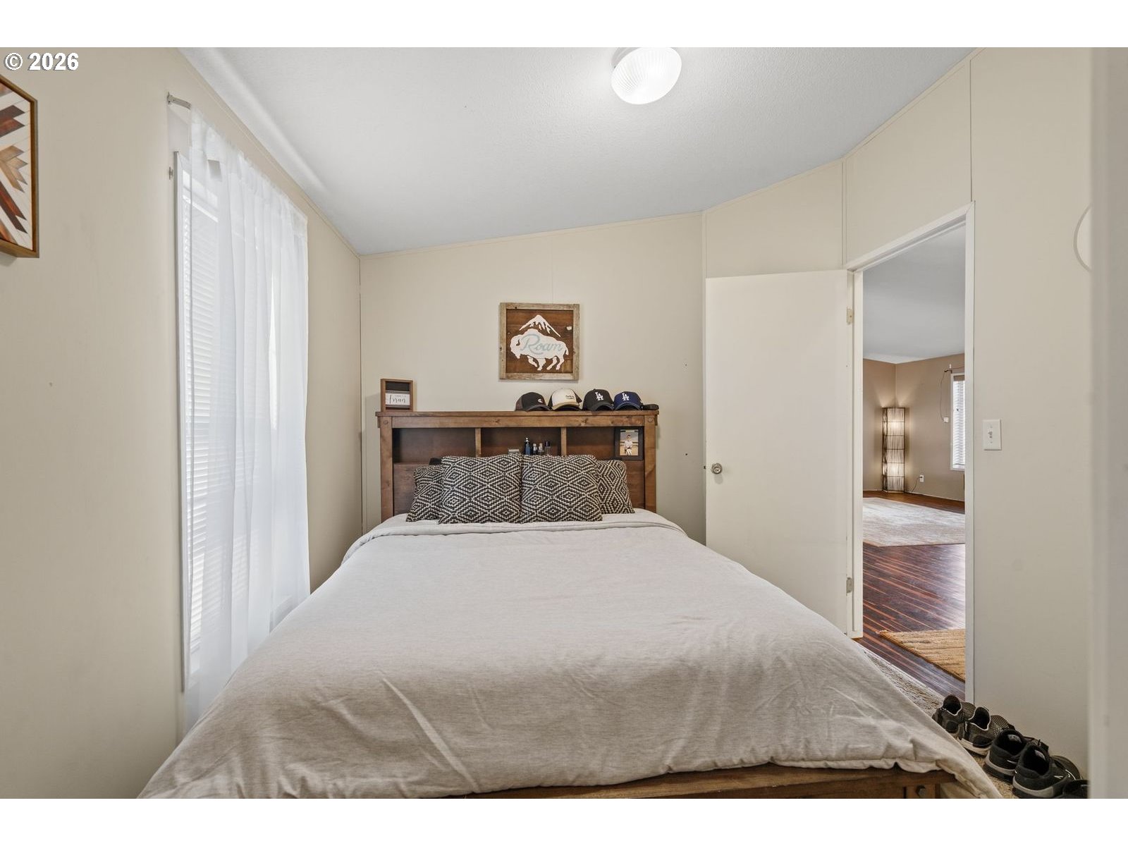 910 East College Echo, OR 97826 - Photo 13 of 23 a bedroom with a bed and a cabinets