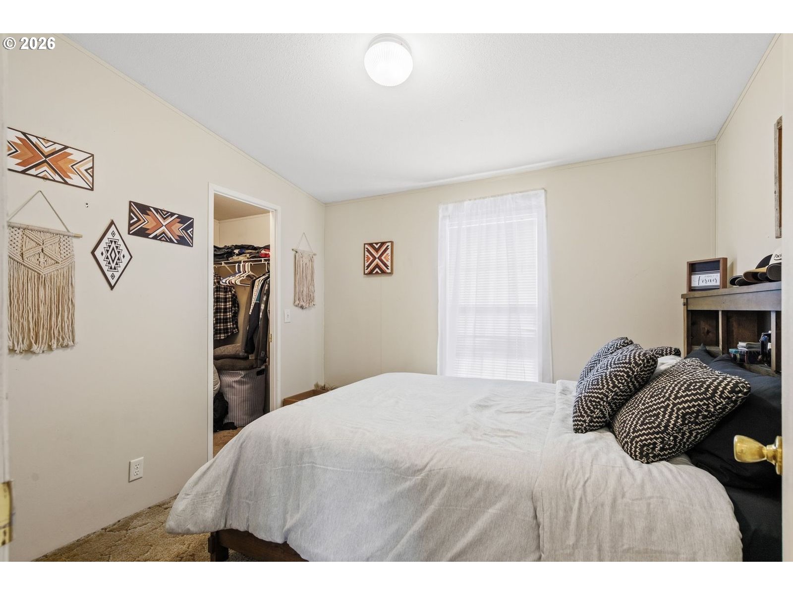 910 East College Echo, OR 97826 - Photo 14 of 23 a bedroom with a bed and a window