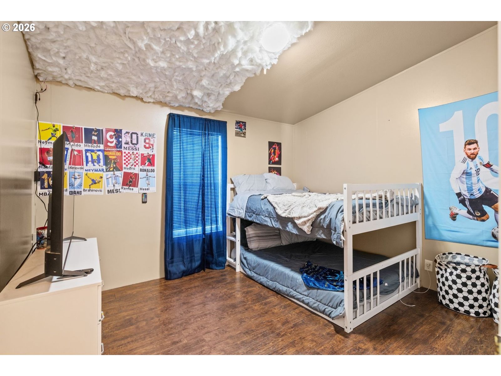 910 East College Echo, OR 97826 - Photo 16 of 23 a bedroom with furniture and baby