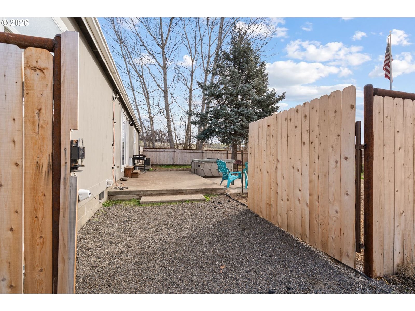 910 East College Echo, OR 97826 - Photo 22 of 23 a view of a back yard with a house