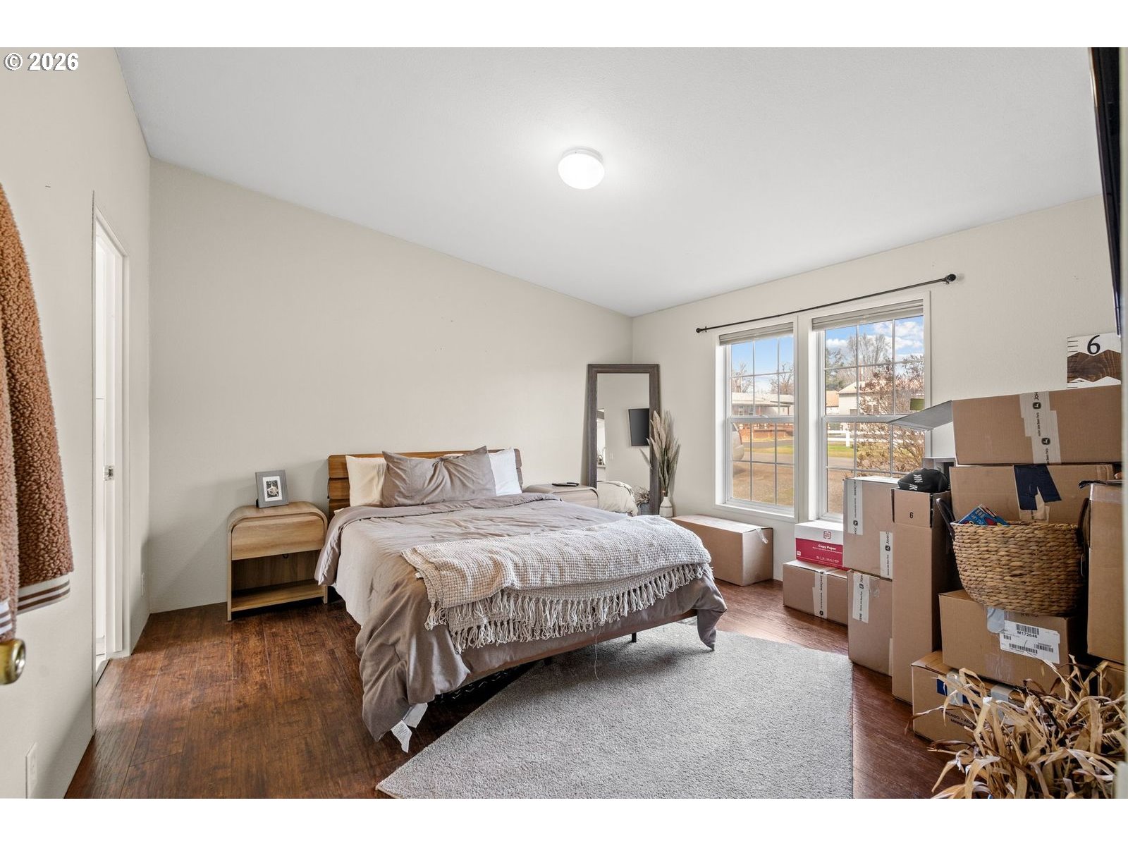 910 East College Echo, OR 97826 - Photo 10 of 23 a bedroom with a bed and large window