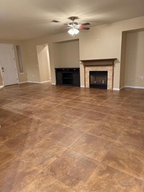 235 Red Poppy Trail Georgetown, TX 78633 - Photo 10 of 21 a view of empty room with a fireplace