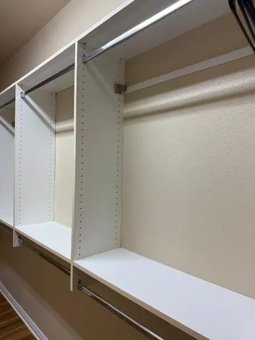 a view of a livingroom with wooden floor