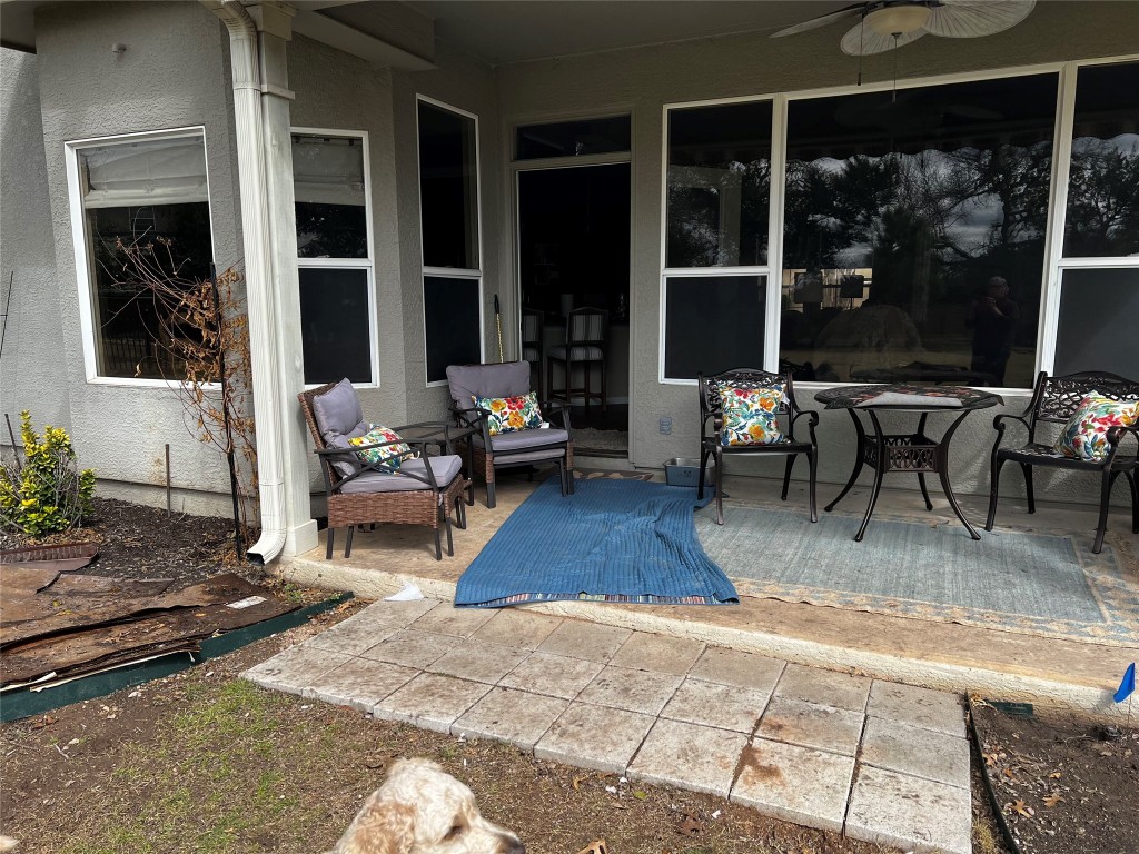 235 Red Poppy Trail Georgetown, TX 78633 - Photo 19 of 21 a view of a dinning table and chair in the patio