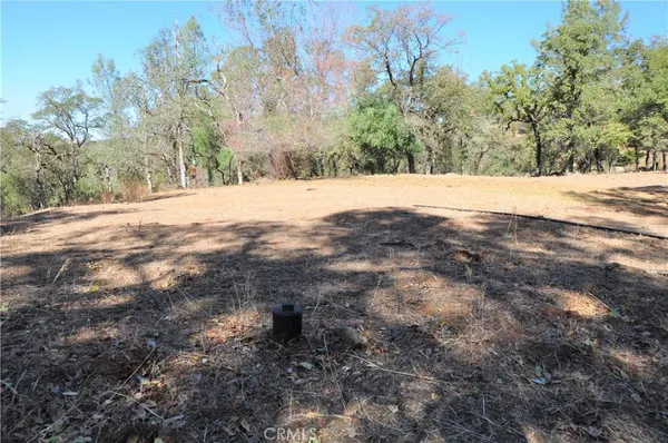 a view of snow on the side of a road