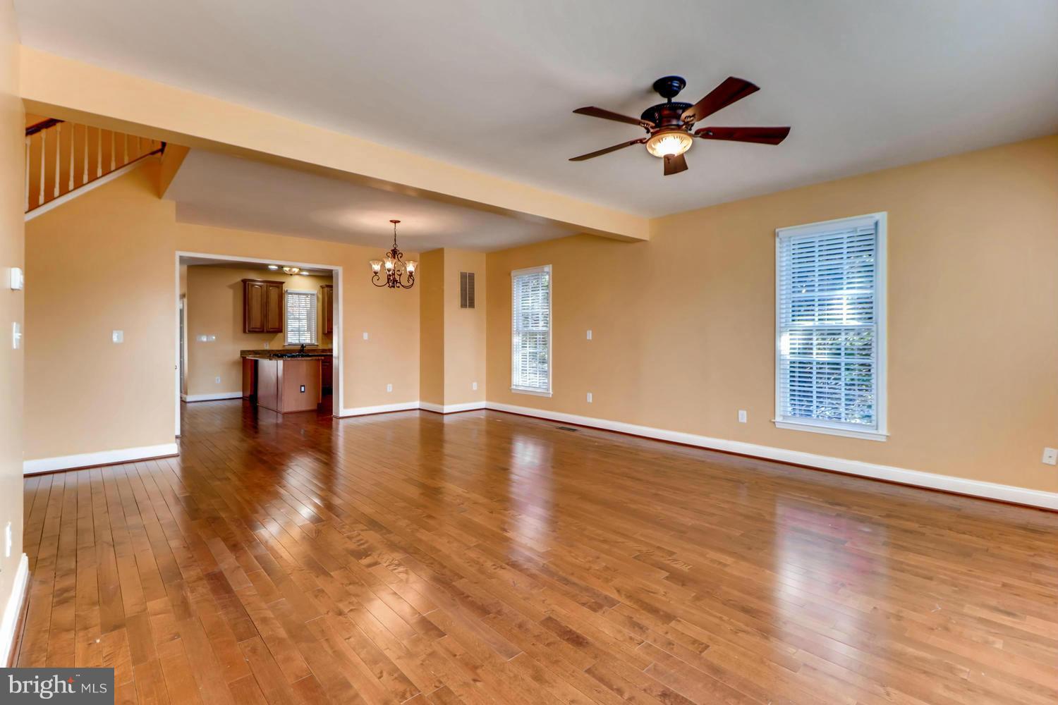 4701 Falls Road Baltimore, MD 21209 - Photo 2 of 28 a view of an empty room with a window and wooden floor