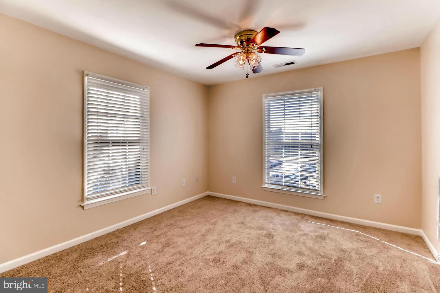4701 Falls Road Baltimore, MD 21209 - Photo 12 of 28 a view of an empty room with a window
