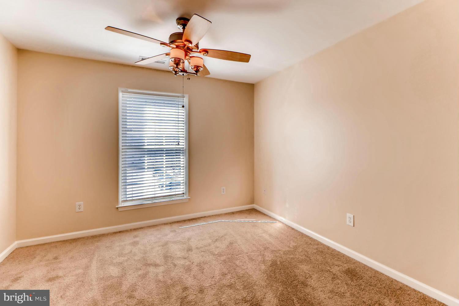 4701 Falls Road Baltimore, MD 21209 - Photo 16 of 28 a view of an empty room with a window