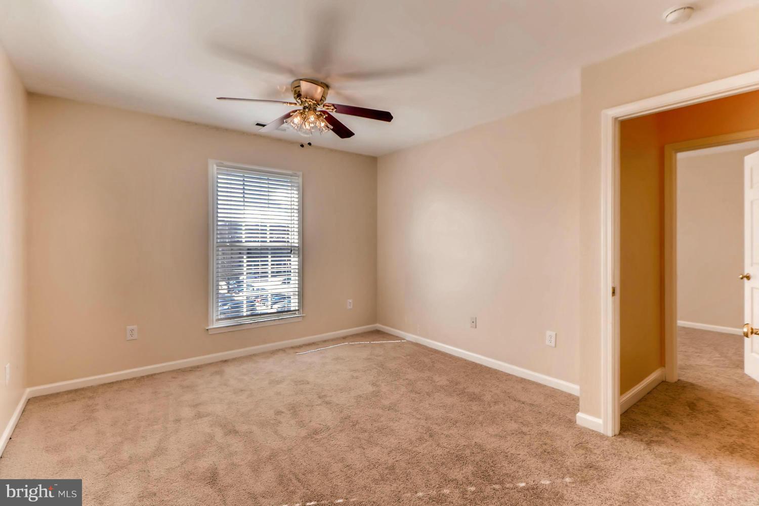 4701 Falls Road Baltimore, MD 21209 - Photo 17 of 28 a view of an empty room with a window