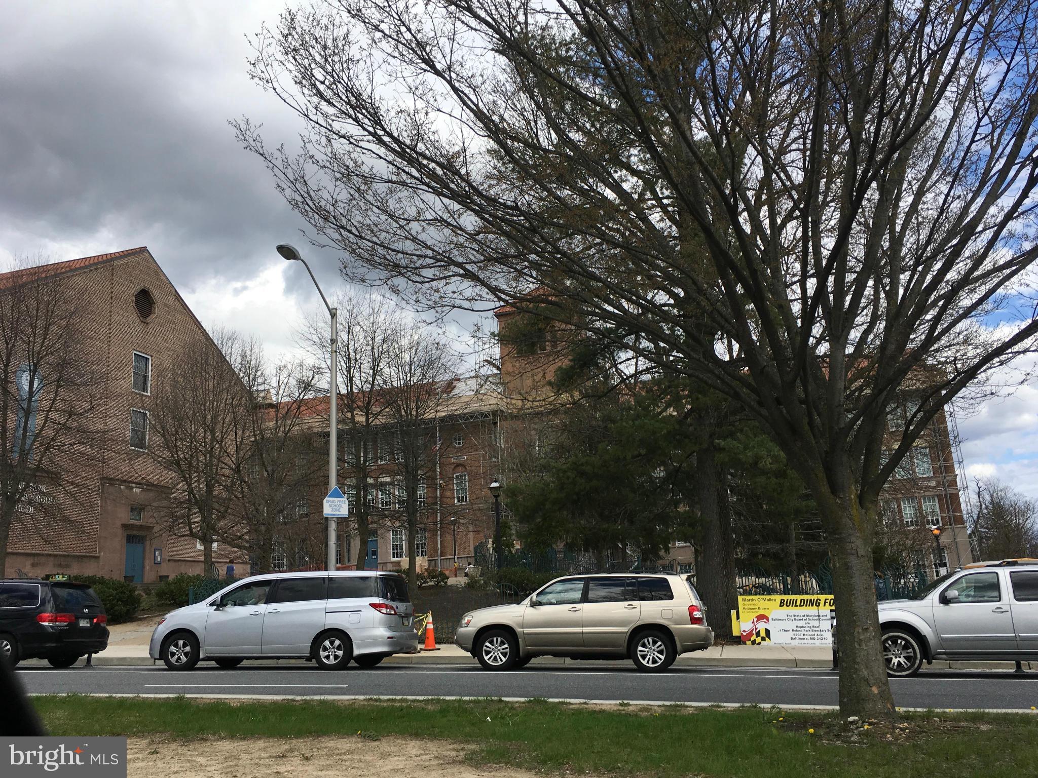 4701 Falls Road Baltimore, MD 21209 - Photo 24 of 28 a view of cars parked in a parking lot