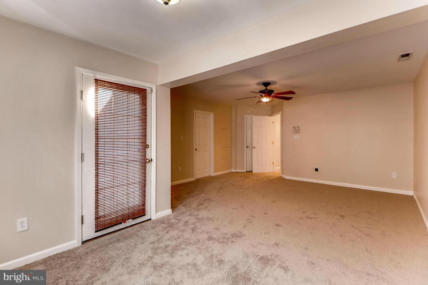 4701 Falls Road Baltimore, MD 21209 - Photo 9 of 28 a view of an empty room with a window