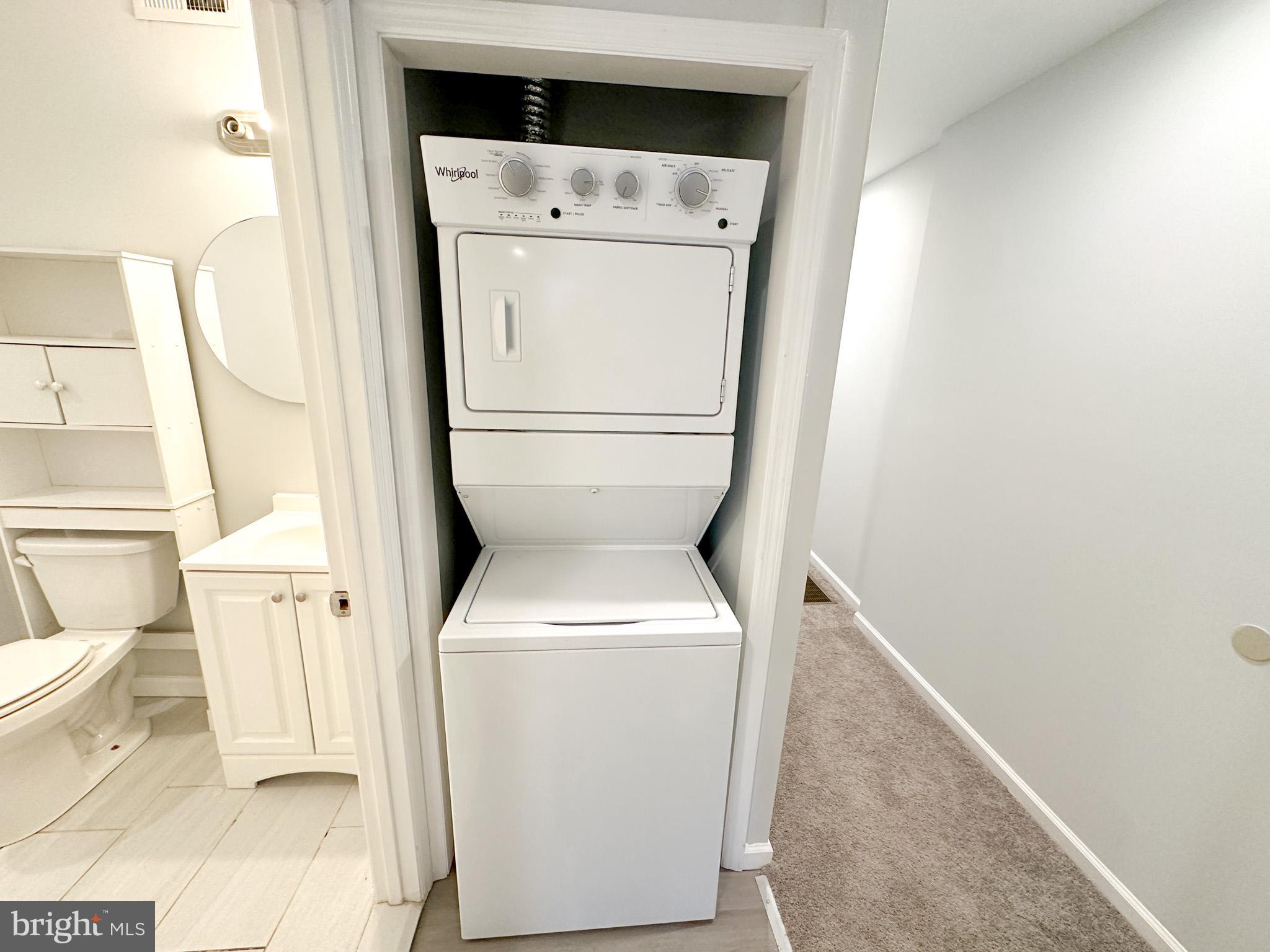 2404 West Thompson Street, Unit A Philadelphia, PA 19121 - Photo 4 of 13 a utility room with dryer and washer