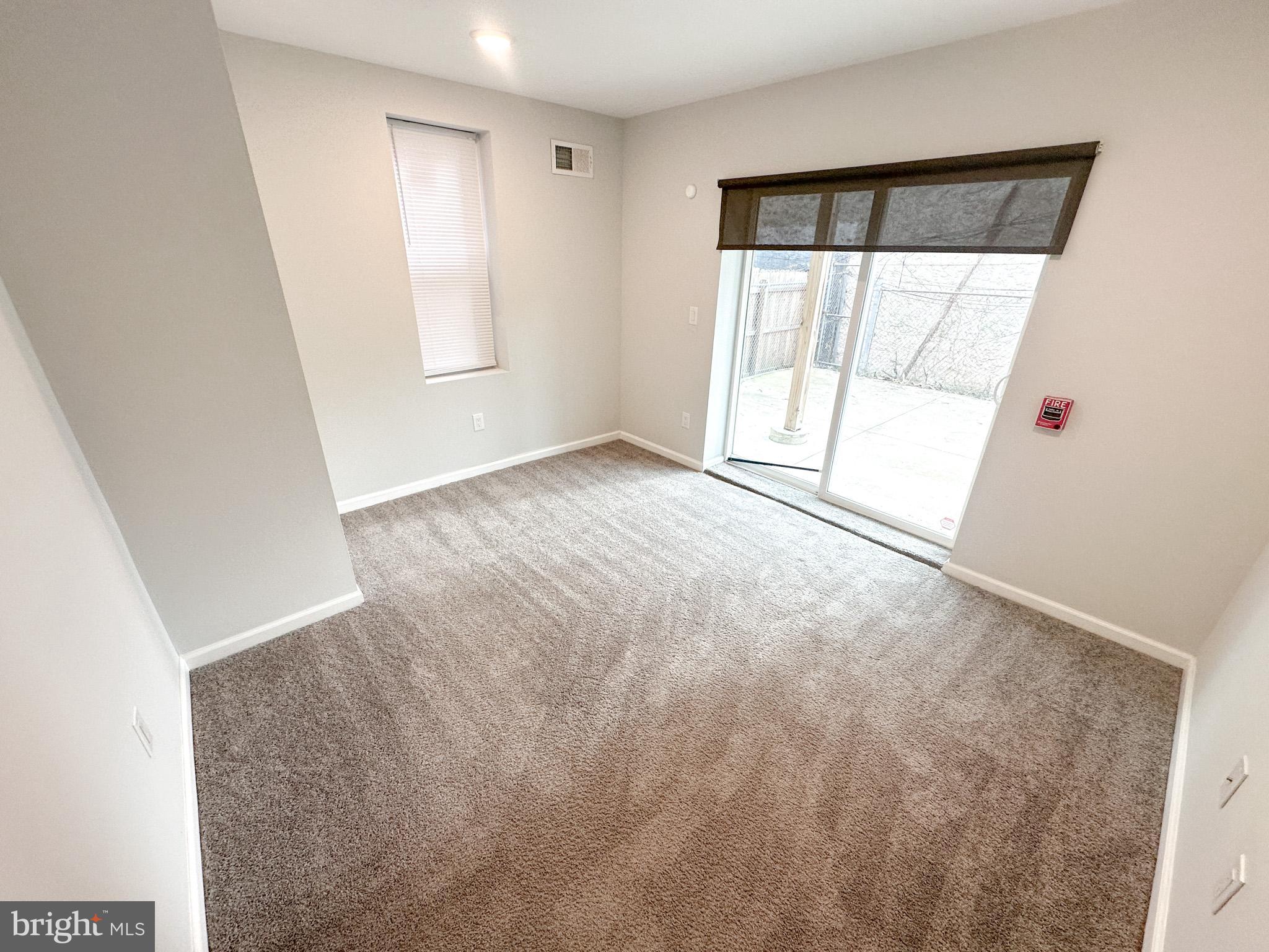 2404 West Thompson Street, Unit A Philadelphia, PA 19121 - Photo 7 of 13 a view of an empty room with a window