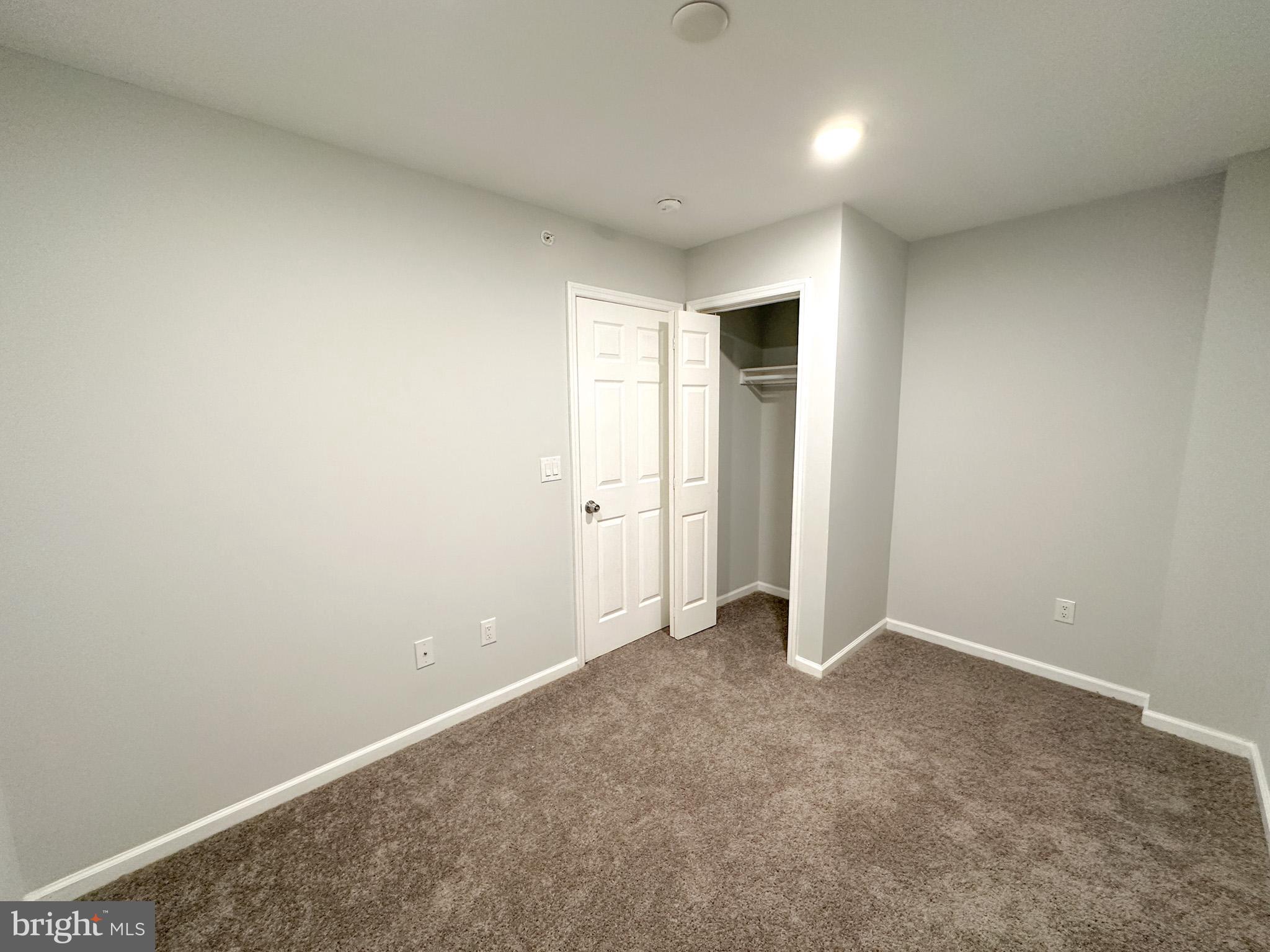 2404 West Thompson Street, Unit A Philadelphia, PA 19121 - Photo 10 of 13 an empty room with an entryway