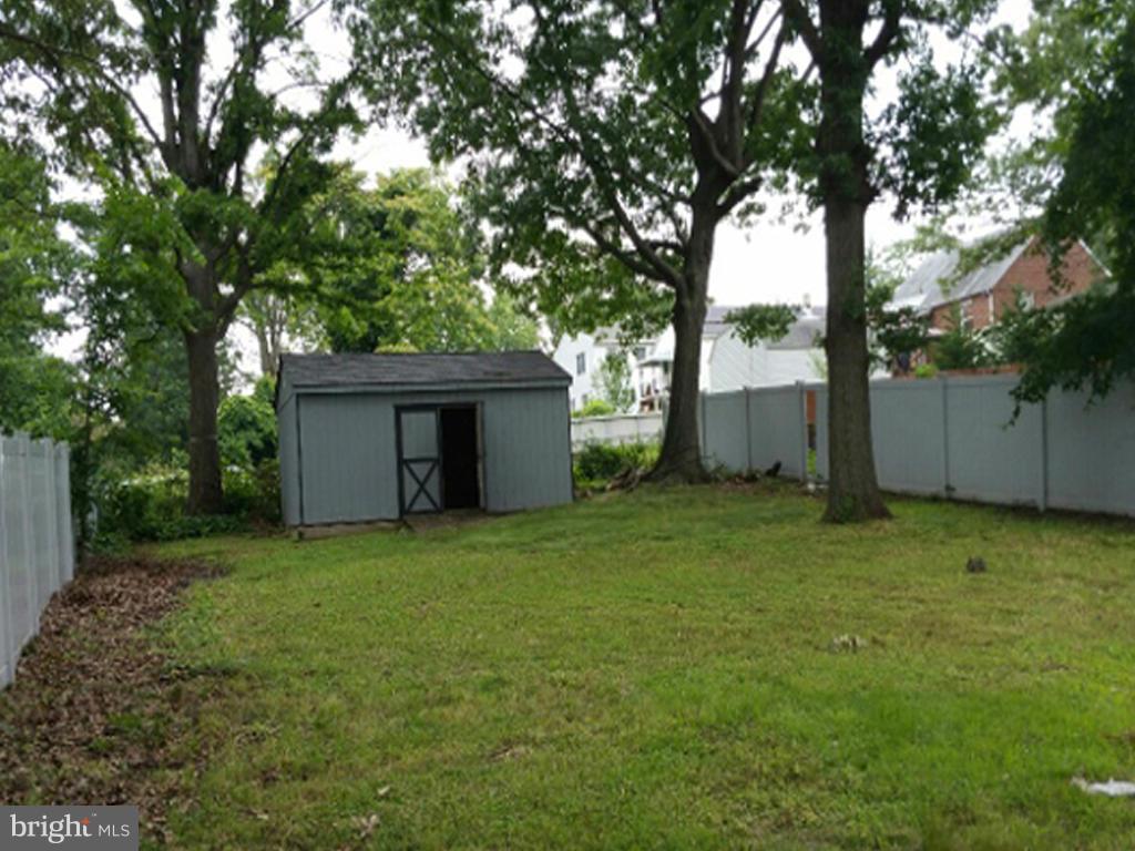 906 Rosedale Avenue Baltimore, MD 21237 - Photo 2 of 4 a view of an house with backyard space and garden