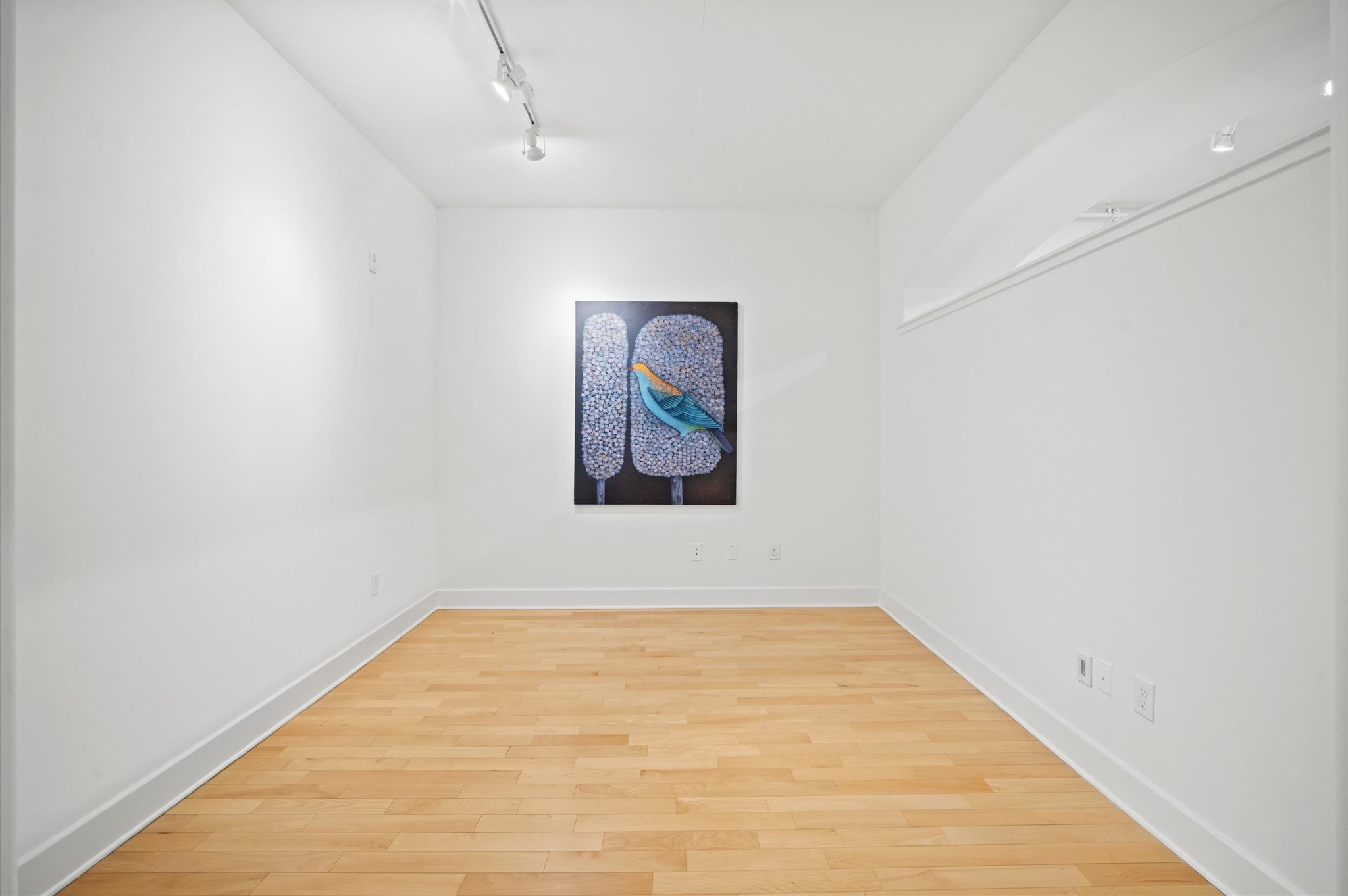 1901 Post Oak Boulevard, Unit 204 Houston, TX 77056 - Photo 20 of 36 A dedicated study that feels anything but secondary. With high ceilings, warm wood floors, and a clean gallery style backdrop, this flexible space works beautifully as a home office, creative studio, or quiet retreat adding real function without interrupting the open loft flow.