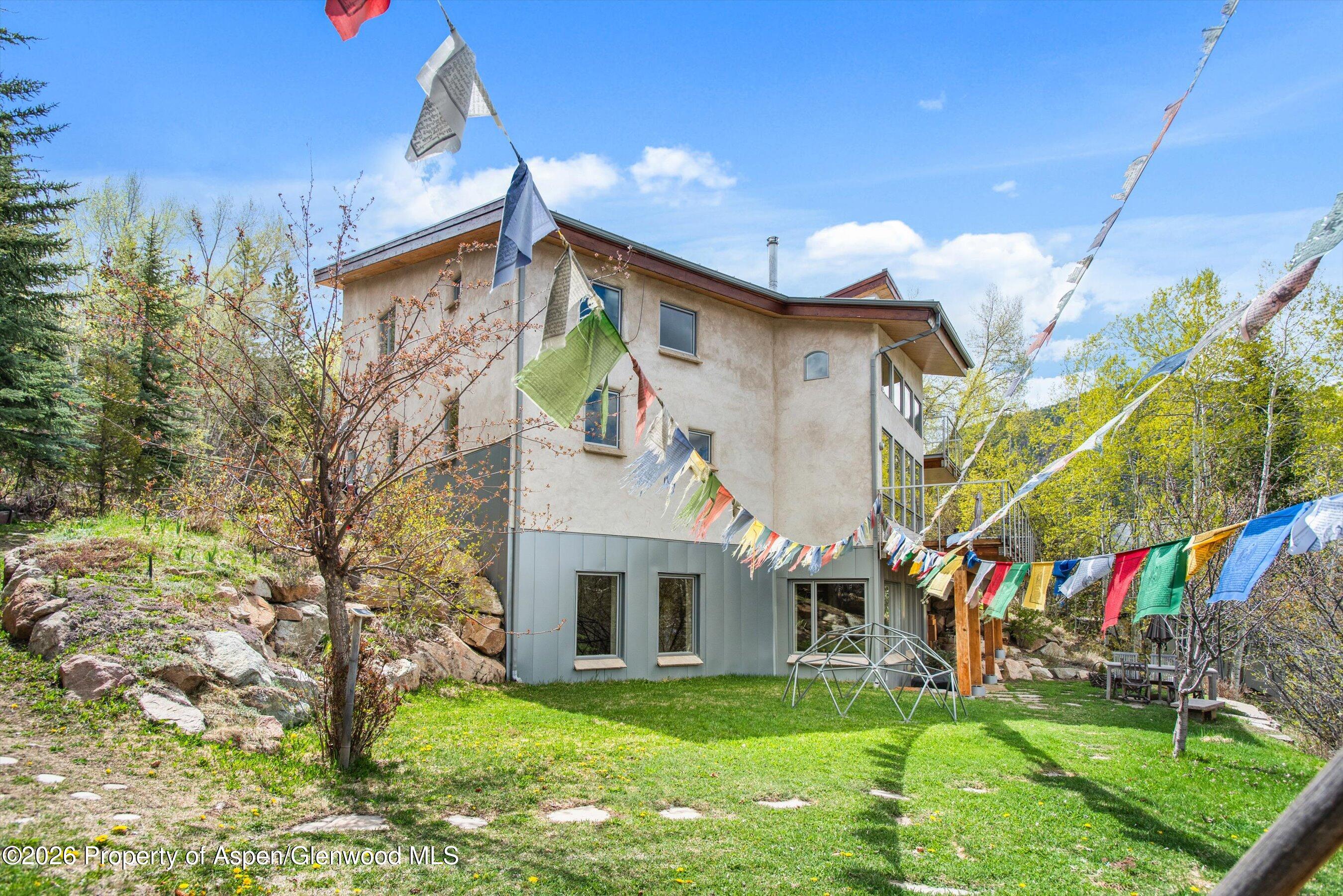 515 Park Circle Aspen, CO 81611 - Photo 22 of 34 a view of a house with a big yard