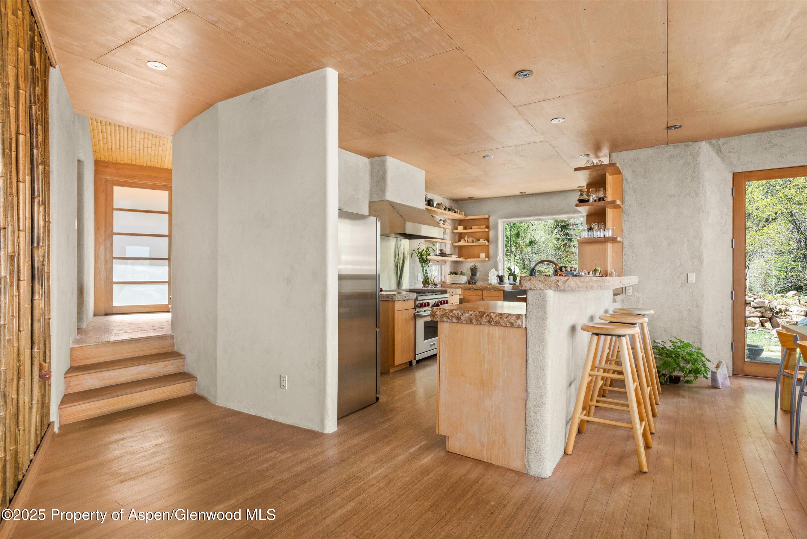 515 Park Circle Aspen, CO 81611 - Photo 6 of 34 a view of a kitchen with wooden floor