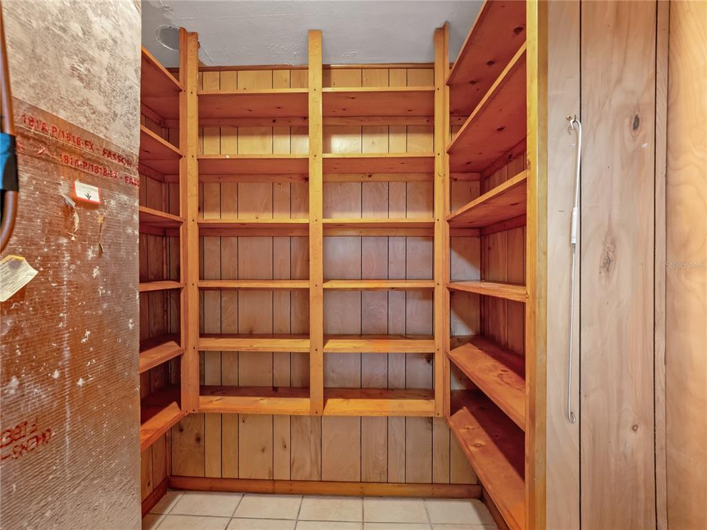 1631 Southeast 17th Street Ocala, FL 34471 - Photo 11 of 36 a view of a room with shelves