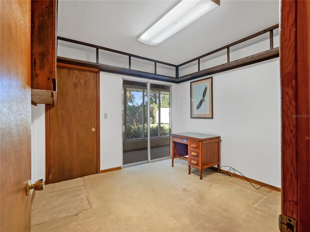 1631 Southeast 17th Street Ocala, FL 34471 - Photo 27 of 36 a furnished livingroom with a window