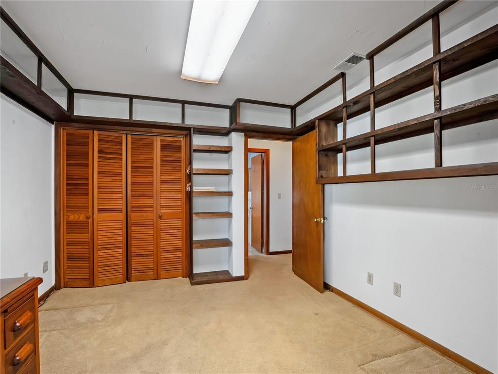 1631 Southeast 17th Street Ocala, FL 34471 - Photo 29 of 36 a view of empty room with stairs and a window