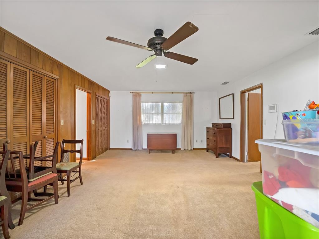 1631 Southeast 17th Street Ocala, FL 34471 - Photo 30 of 36 a view of an empty room with furniture and a window