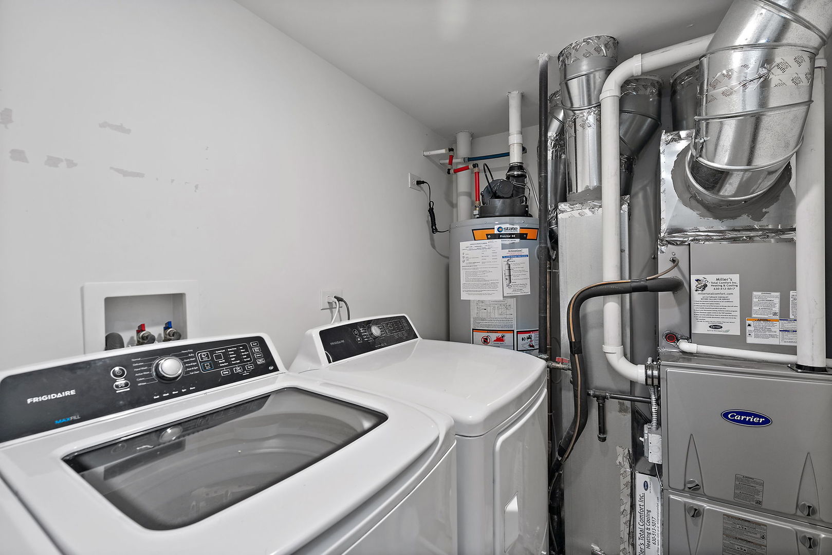 2360 Upland Road, Unit 2267 Hampshire, IL 60140 - Photo 13 of 26 a utility room with multiple dryer and washer