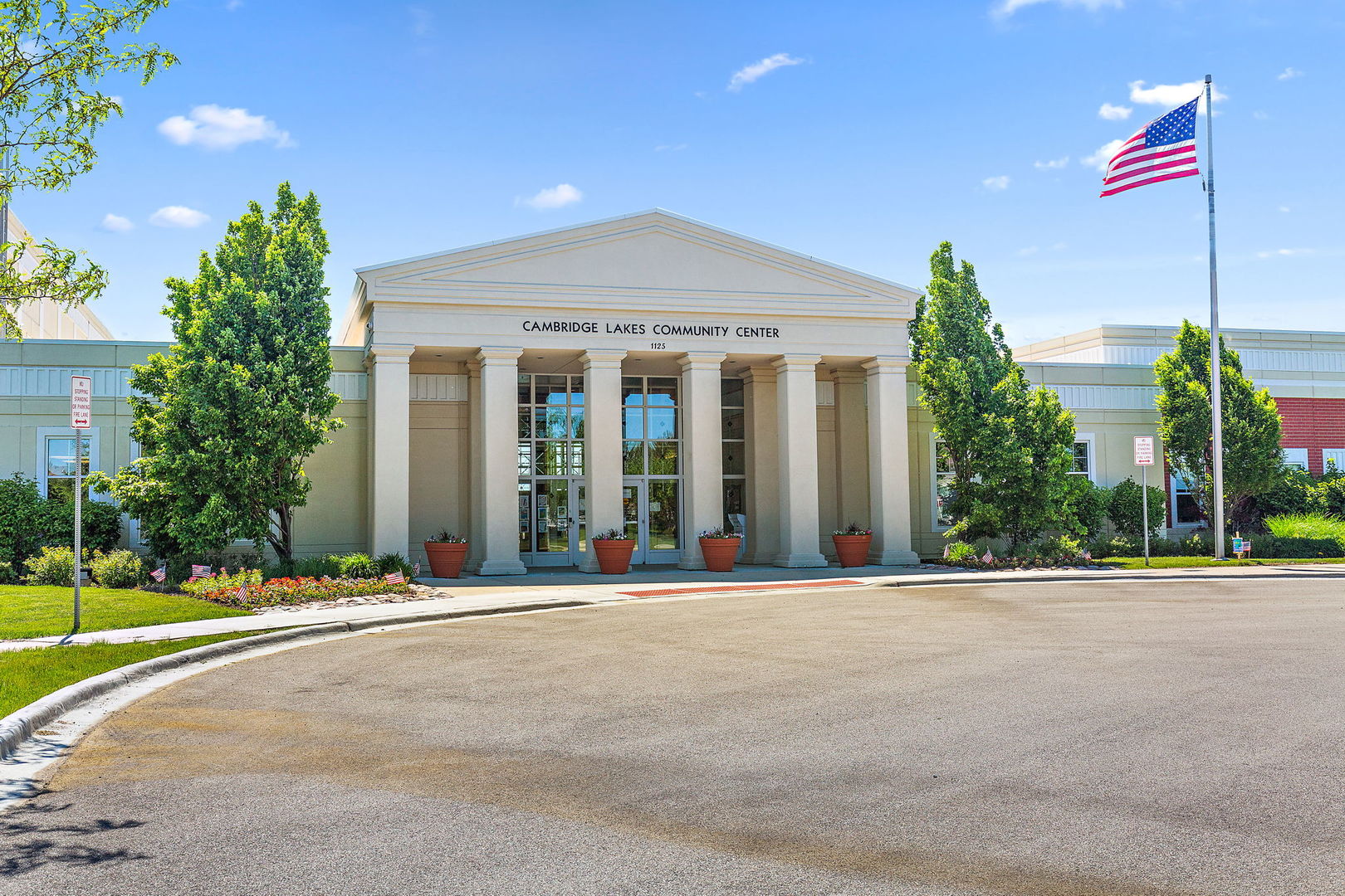 2360 Upland Road, Unit 2267 Hampshire, IL 60140 - Photo 18 of 26 a front view of a house with a garden and plants