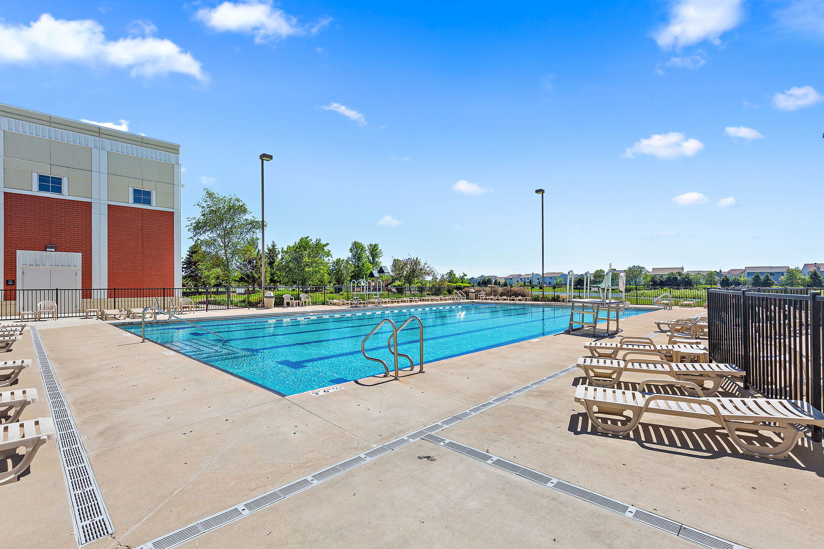 2360 Upland Road, Unit 2267 Hampshire, IL 60140 - Photo 25 of 26 a view of swimming pool with outdoor seating and yard