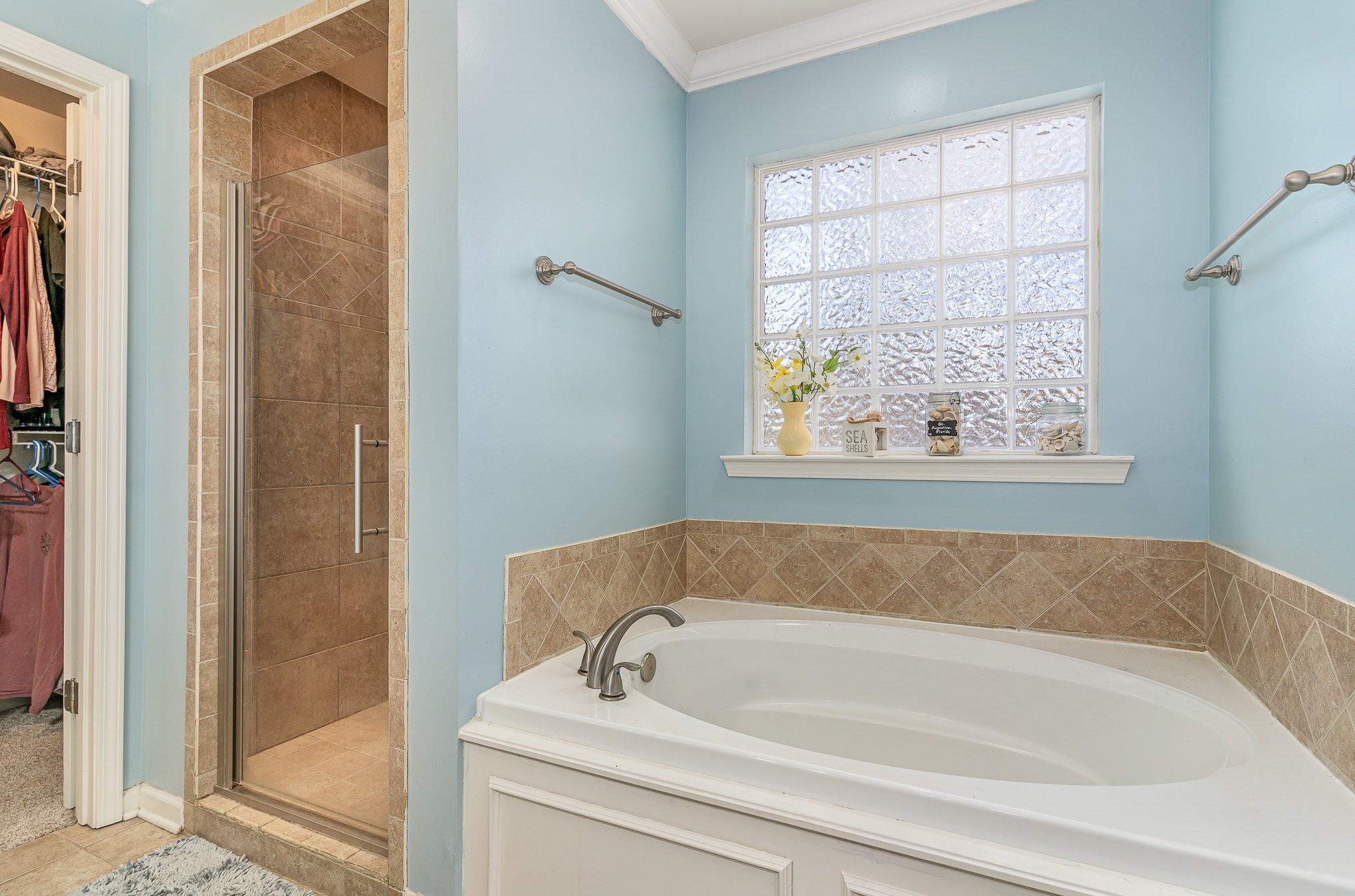 242 Foundry Circle Murfreesboro, TN 37128 - Photo 15 of 26 a bathroom with a tub and shower