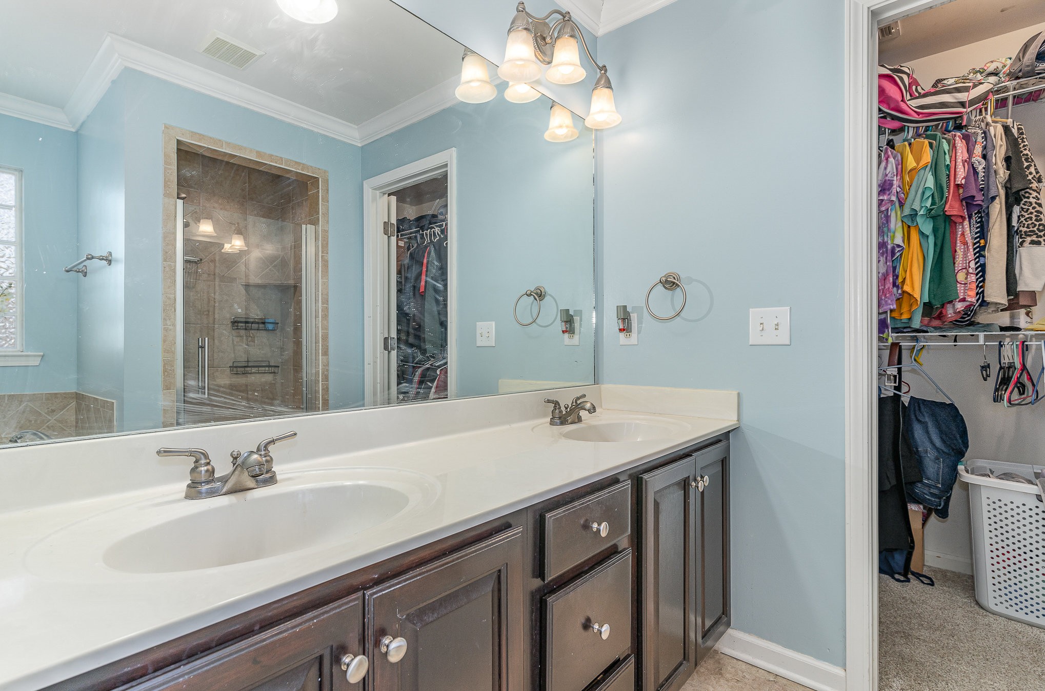 242 Foundry Circle Murfreesboro, TN 37128 - Photo 16 of 26 a bathroom with a sink a vanity and a mirror