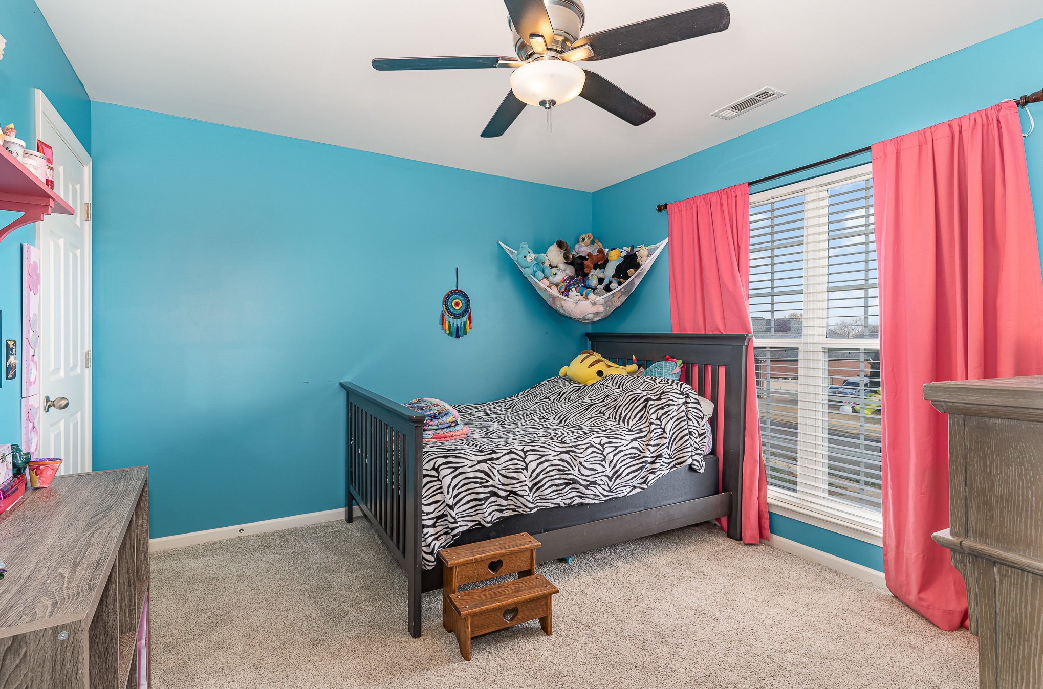 242 Foundry Circle Murfreesboro, TN 37128 - Photo 17 of 26 a bedroom with a bed and a window