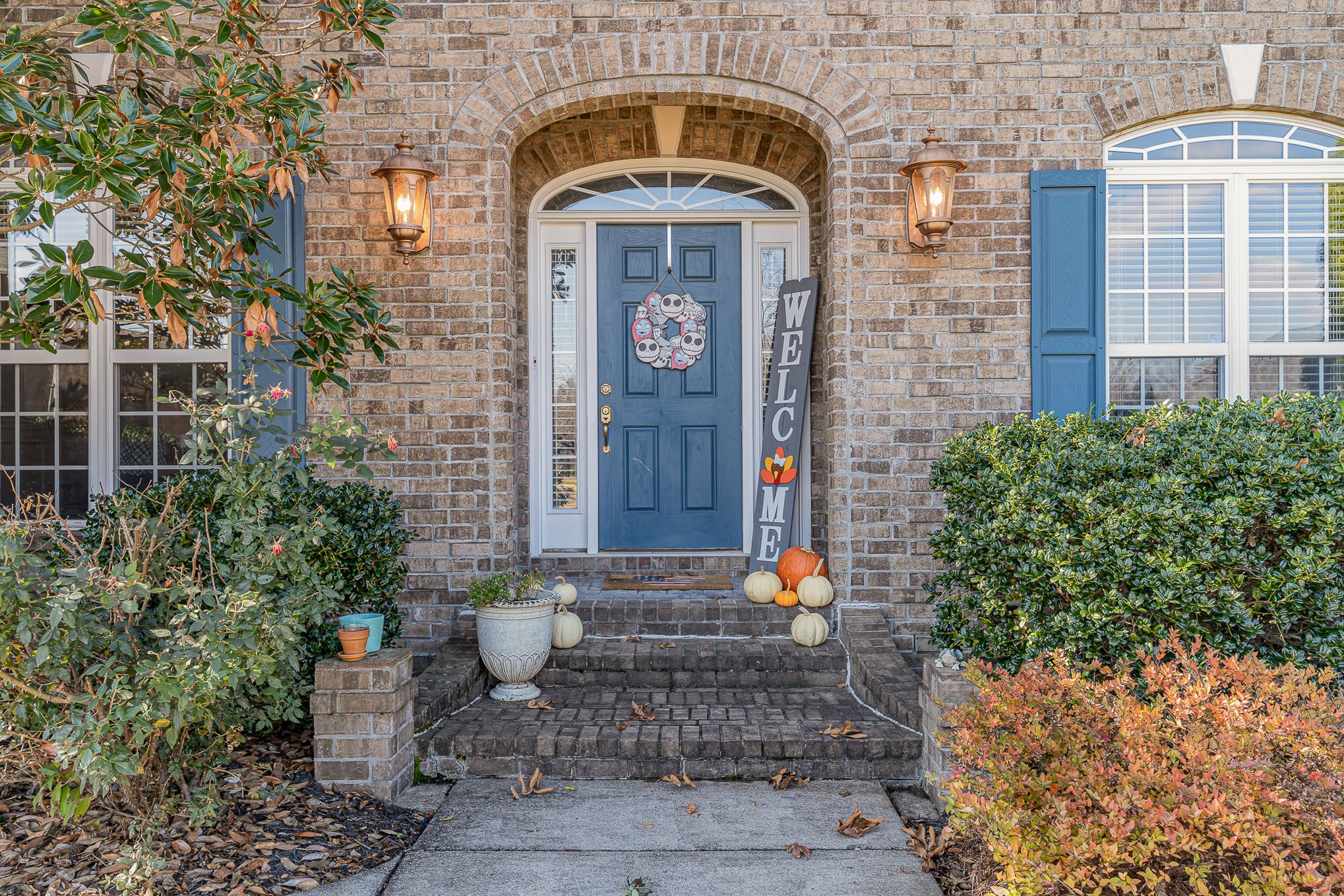 242 Foundry Circle Murfreesboro, TN 37128 - Photo 2 of 26 a front view of a house with garden
