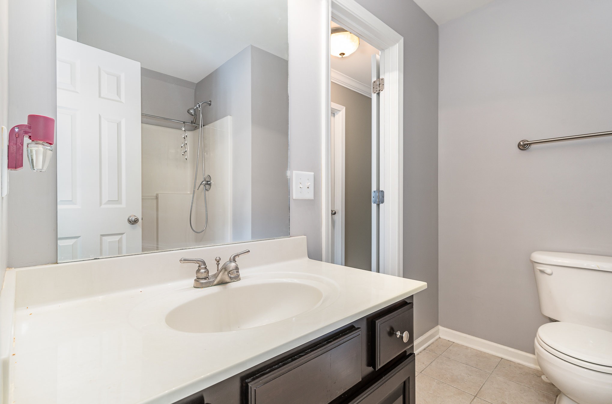 242 Foundry Circle Murfreesboro, TN 37128 - Photo 23 of 26 a bathroom with a sink toilet and shower