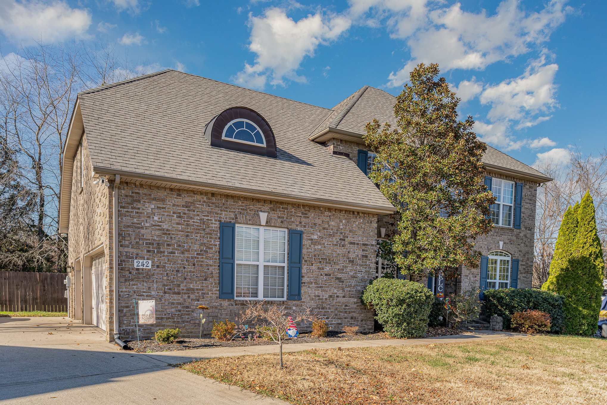 242 Foundry Circle Murfreesboro, TN 37128 - Photo 3 of 26 a view of a brick house with a street