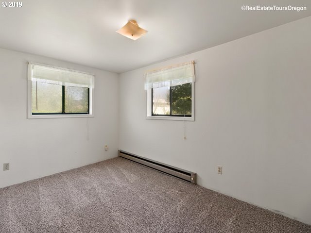 24311 South Larkin Road Beavercreek, OR 97004 - Photo 15 of 31 an empty room with windows