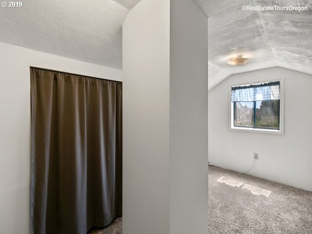 24311 South Larkin Road Beavercreek, OR 97004 - Photo 22 of 31 a view of a hallway with closet area