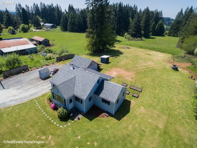 24311 South Larkin Road Beavercreek, OR 97004 - Photo 24 of 31 an aerial view of a house with garden space and street view