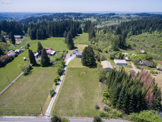 24311 South Larkin Road Beavercreek, OR 97004 - Photo 27 of 31 a view of a lake with a yard