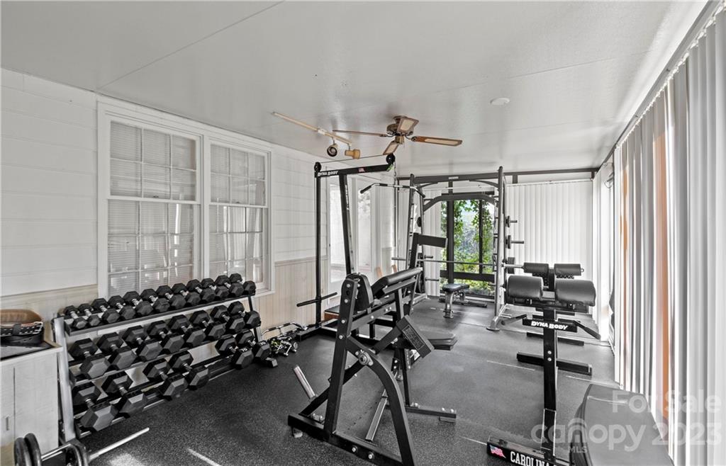 13514 O O'Malley Drive Matthews, NC 28105 - Photo 11 of 20 a view of a room with gym equipment