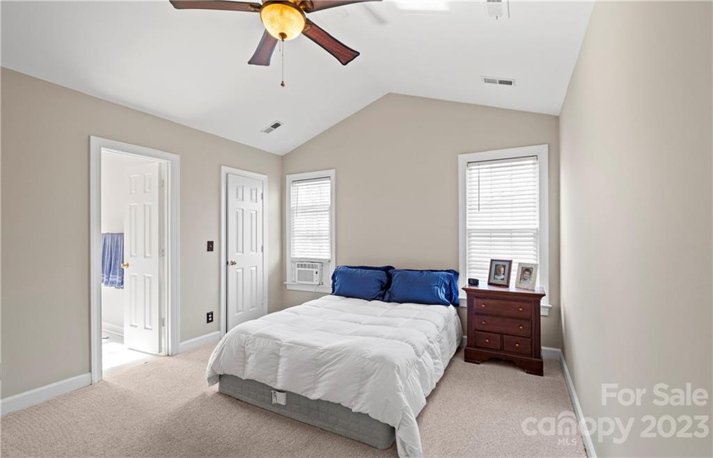 13514 O O'Malley Drive Matthews, NC 28105 - Photo 12 of 20 a bedroom with a bed and dresser