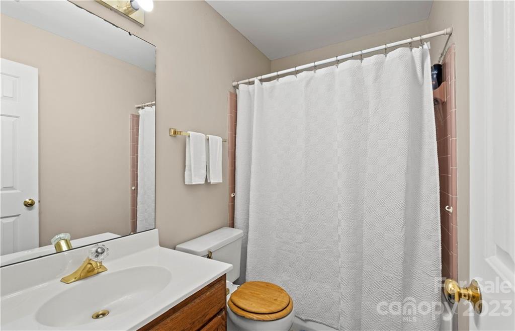 13514 O O'Malley Drive Matthews, NC 28105 - Photo 15 of 20 a bathroom with a sink and toilet