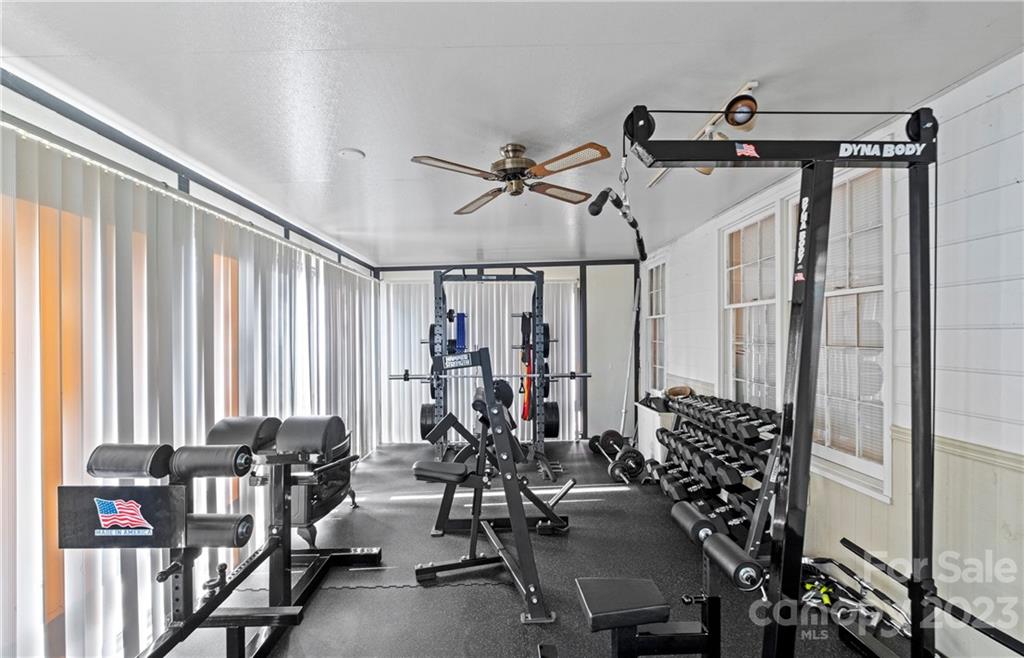 13514 O O'Malley Drive Matthews, NC 28105 - Photo 10 of 20 a view of a livingroom with furniture and windows
