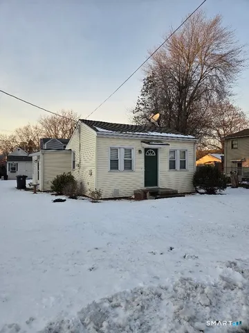 a view of a house with a patio