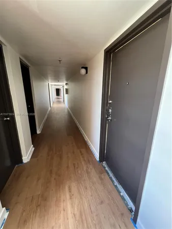 a view of hallway with stairs