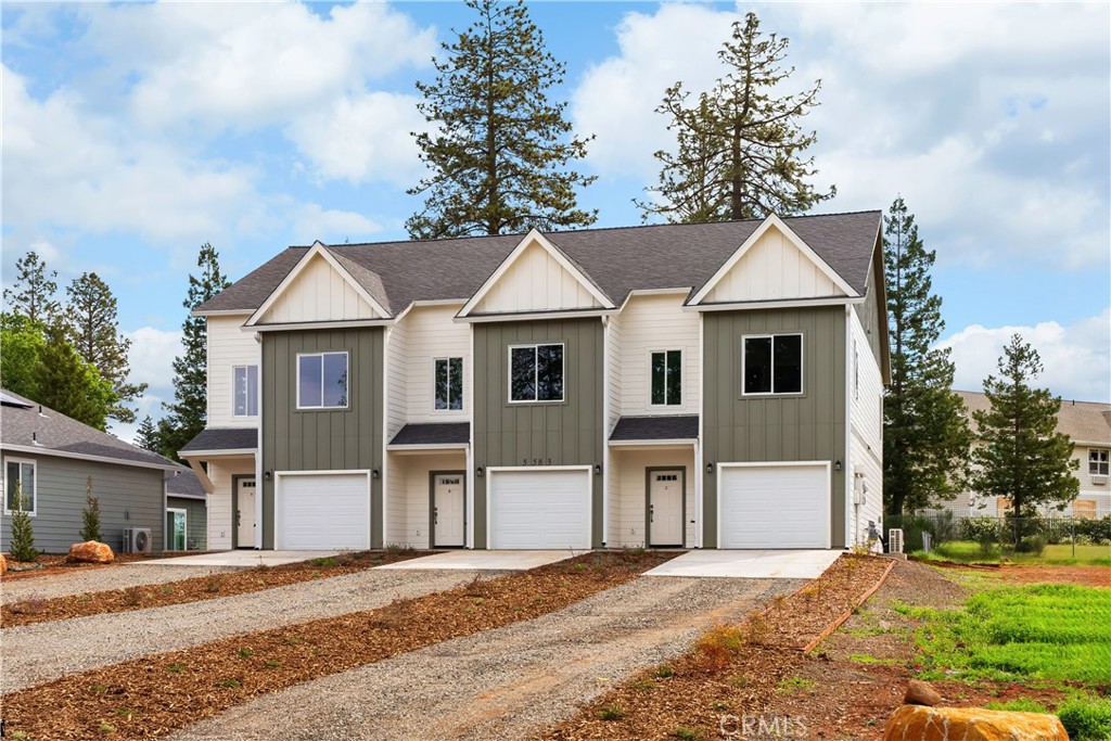 5583 Linrich Lane Paradise, CA 95969 - Photo 1 of 33 a front view of a house with a yard and garage